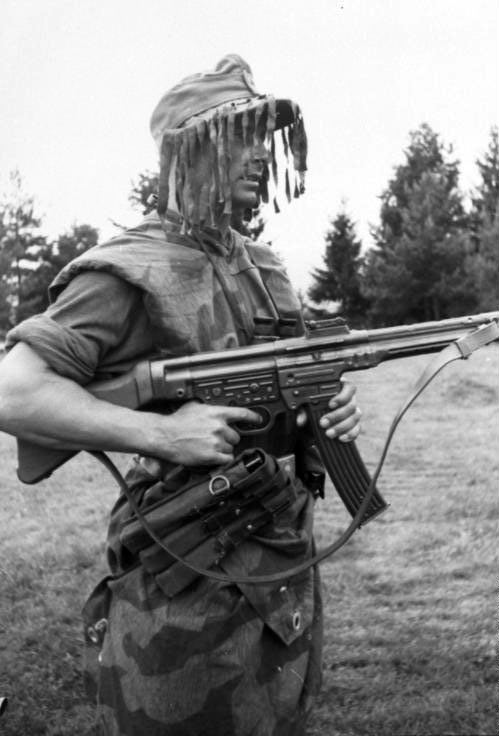 German infantryman with equipment straps and pouches, July 1944