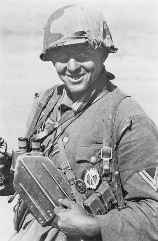 German infantryman at Stalingrad, September 1942, with Y-straps, folding spade, binoculars and a covered steel helmet