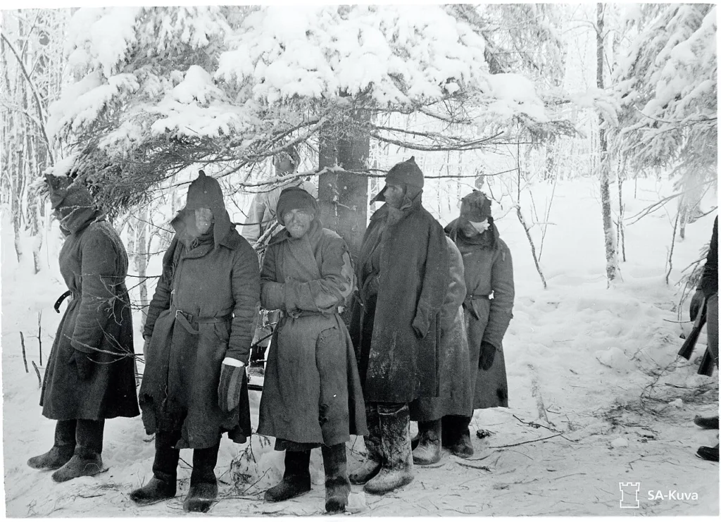 Soviet prisoners of war in budenovka helmets, Winter War, February 1940